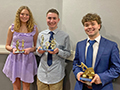  students pose with athletic awards